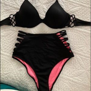 PINK high-waisted bikini with side cut outs. Super comfy and flattering.